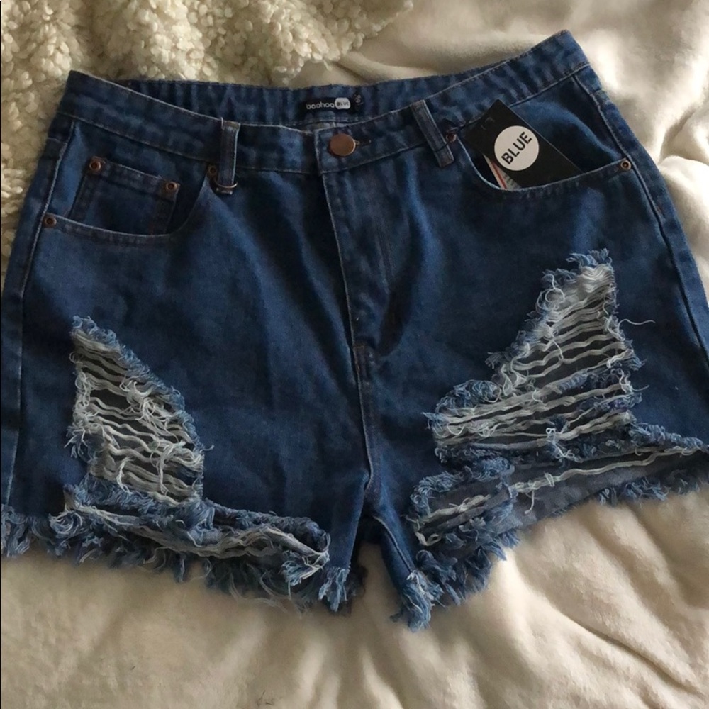High wasted, heavily distressed, jean shorts